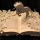 Illustration for article titled Storybook characters burst from their pages in these incredible paper sculptures